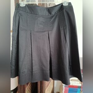 Talbots black pleated A-line skirt. Size 2 petite.
